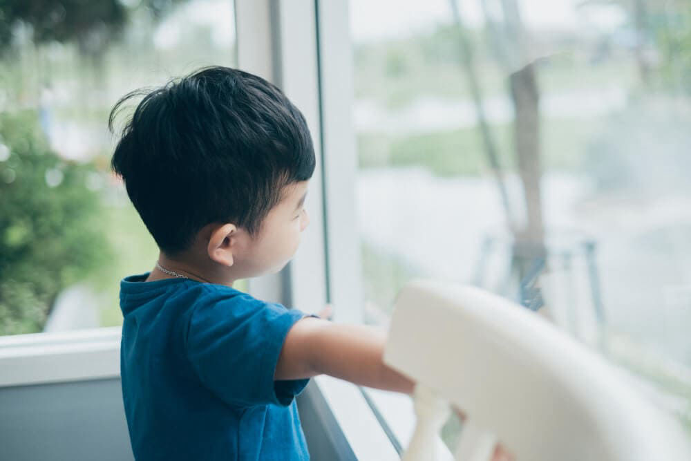 Child looking outside