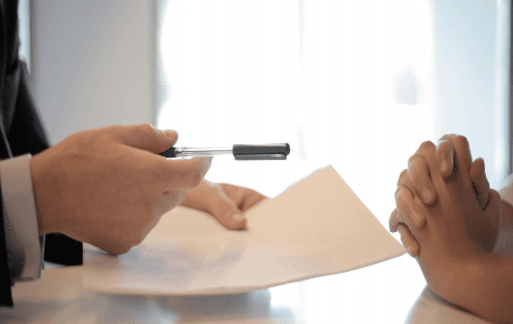 Two persons signing security bonds